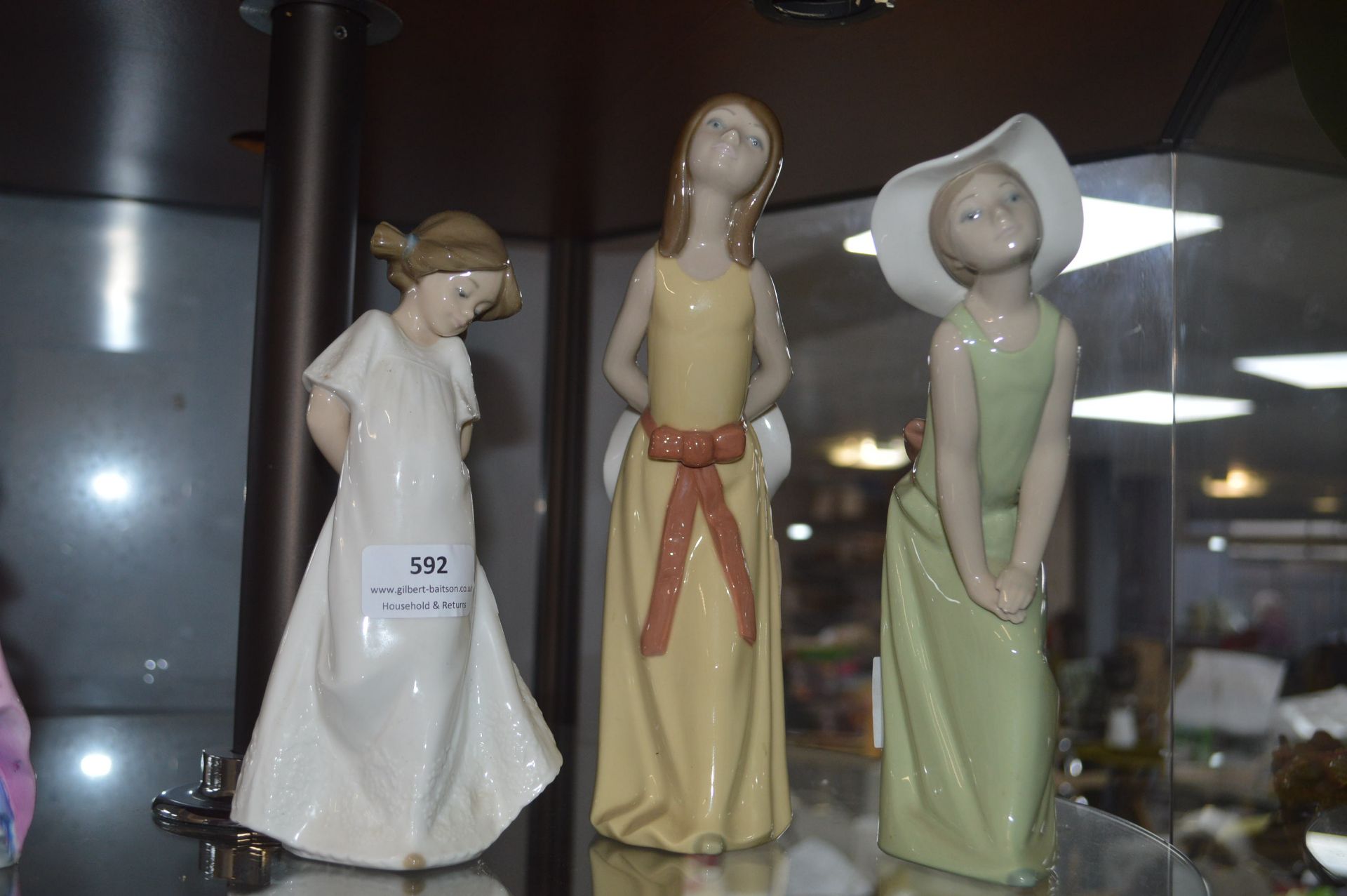 Three Lladro and Nao Figurines