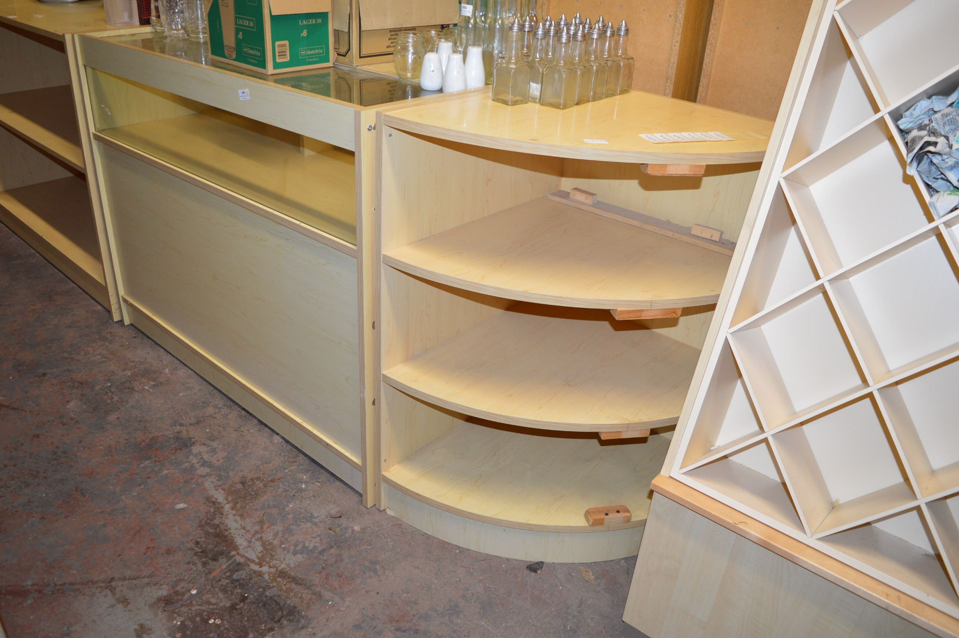 Corner Shelf Unit and a Glass Countertop Display Unit