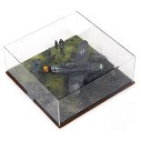 A 1:32 scale cased diorama model of a Messerschmitt 109G, central Germany 1944, 15cm high, 34cm wide