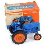 A Chad Valley diecast model of a New Fordson Major tractor, blue, boxed.