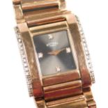 A Rotary rose gold plate on stainless steel lady's wristwatch, of tank form, rectangular black dial,