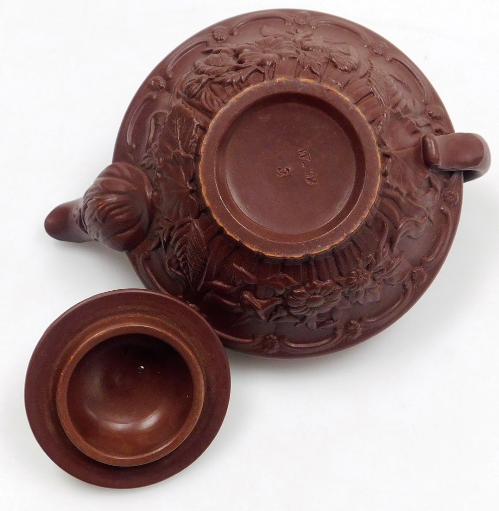 A late 19thC Wilhelm Schiller & Sohn redware tete-a-tete, moulded with flowers and leaves, impressed - Image 7 of 10