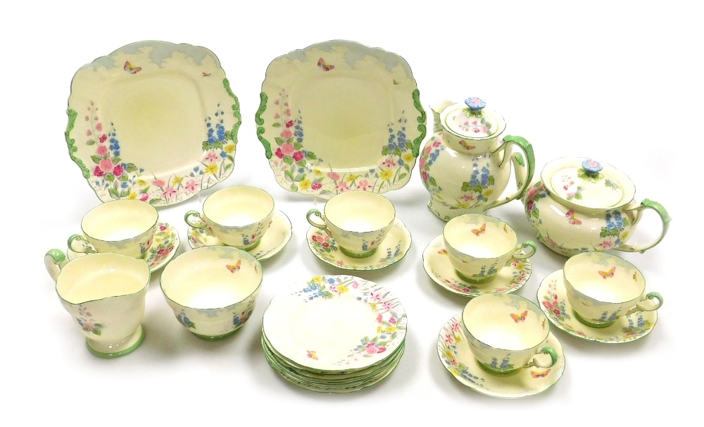 A mid century Paragon porcelain part tea service, decorated with meadow flowers, printed mark, compr