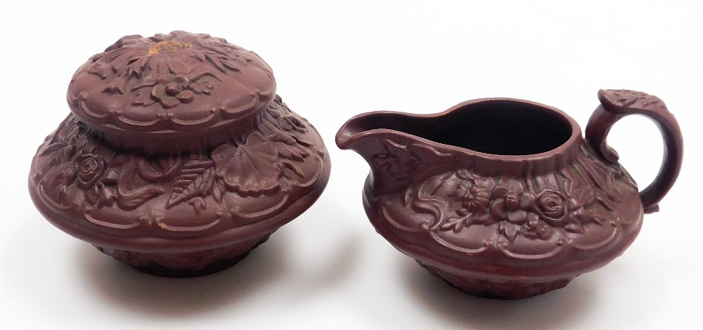 A late 19thC Wilhelm Schiller & Sohn redware tete-a-tete, moulded with flowers and leaves, impressed - Image 10 of 10
