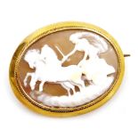 A late 19thC Continental shell cameo brooch, depicting Aurora driving a chariot, drawn by two horses