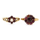A 9ct gold and garnet flower head ring, size O, 2.1g, together with a 9ct gold garnet and seed pearl