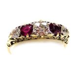 A ruby and diamond five stone ring, set in yellow metal, diamonds approx 0.75ct, size O/P, 3.5g.