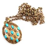 A Victorian oval turquoise set hair locket pendant, in a lattice work design, yellow metal, on a bel