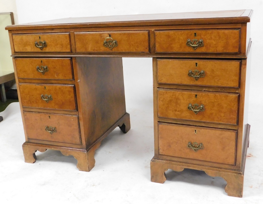 A mahogany twin pedestal desk, with a gilt tooled brown leather top, over one long and eight short d - Image 2 of 2