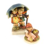 A Hummel pottery figure modelled as Stormy Weather, and another modelled as Chick Girl. (2)