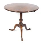 A George III mahogany tilt top occasional table, raised on a turned column, over three cabriole leg