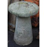 A reconstituted stone staddle stone, 72cm high, 47cm diameter.