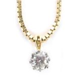 An diamond pendant and chain, the pendant set with central diamond in a raised basket white gold set