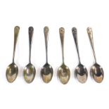 A set of six Elizabeth II silver shell pattern coffee spoons, cased, Sheffield 1964, 1.79oz.