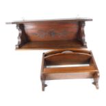 An early 20thC mahogany wall shelf, with three bottle recesses above a shelf, 28.5cm high, together