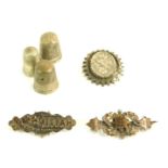 Three Victorian bar brooches, comprising a Mizpah brooch, 4.5cm wide, a bar brooch with central star