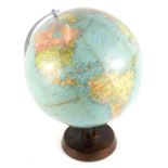 A Philips' Challenge globe, circa 1960, on a turned wooden base, 13.5cm diameter.