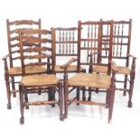 A harlequin set of five 18thC and later elm dining chairs, comprising a pair of spindle back carvers