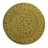 A George III spade guinea token dated 1786.