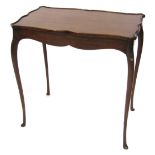 An Edwardian serpentine mahogany occasional table, raised on leaf capped slender cabriole legs, 70.5