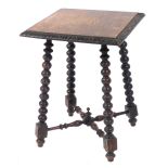 A Victorian oak occasional table, the square top with floral carved border, raised on bobbin turned