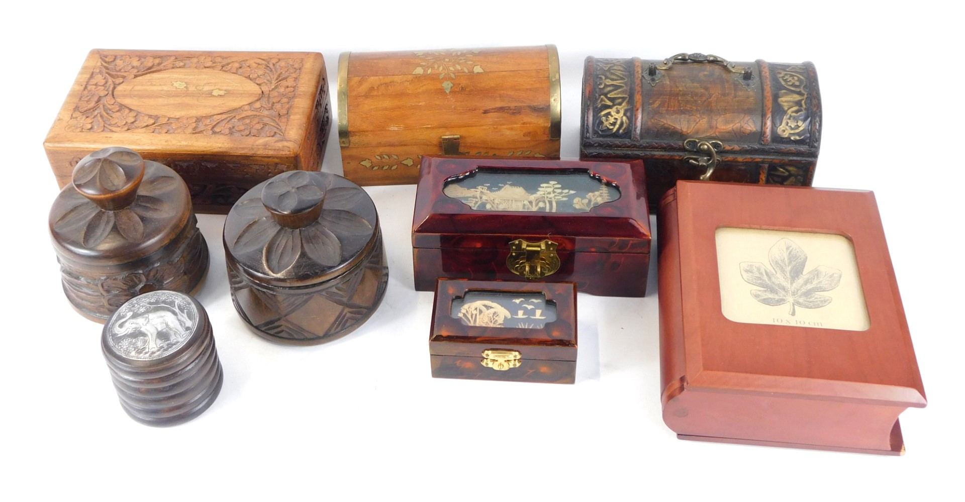 A quantity of trinket boxes, comprising a hardwood and domed topped brass inlaid trunk, a cork diora