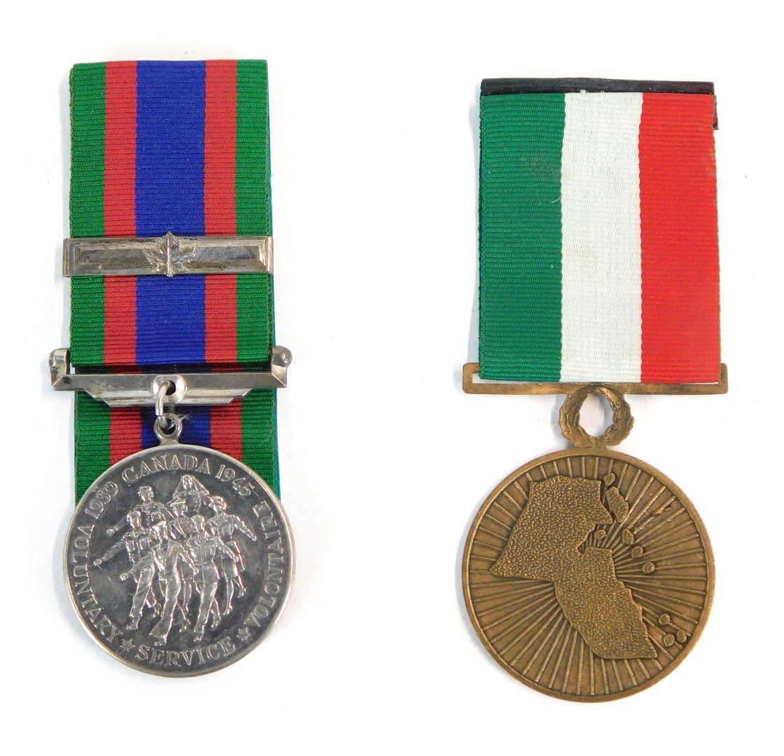 A Kuwaiti Liberation medal, together with a WWII Canadian Volunteer Overseas medal. (2) NB. Lots 1 t
