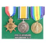 A Great War 1915 medal trio, awarded to 14928 Pte Charles Staples 7th Oxfordshire and Buckingham Lig