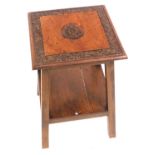 A unique small hall hardwood table, with a carving of the crest of The Lancashire Fusiliers, with a