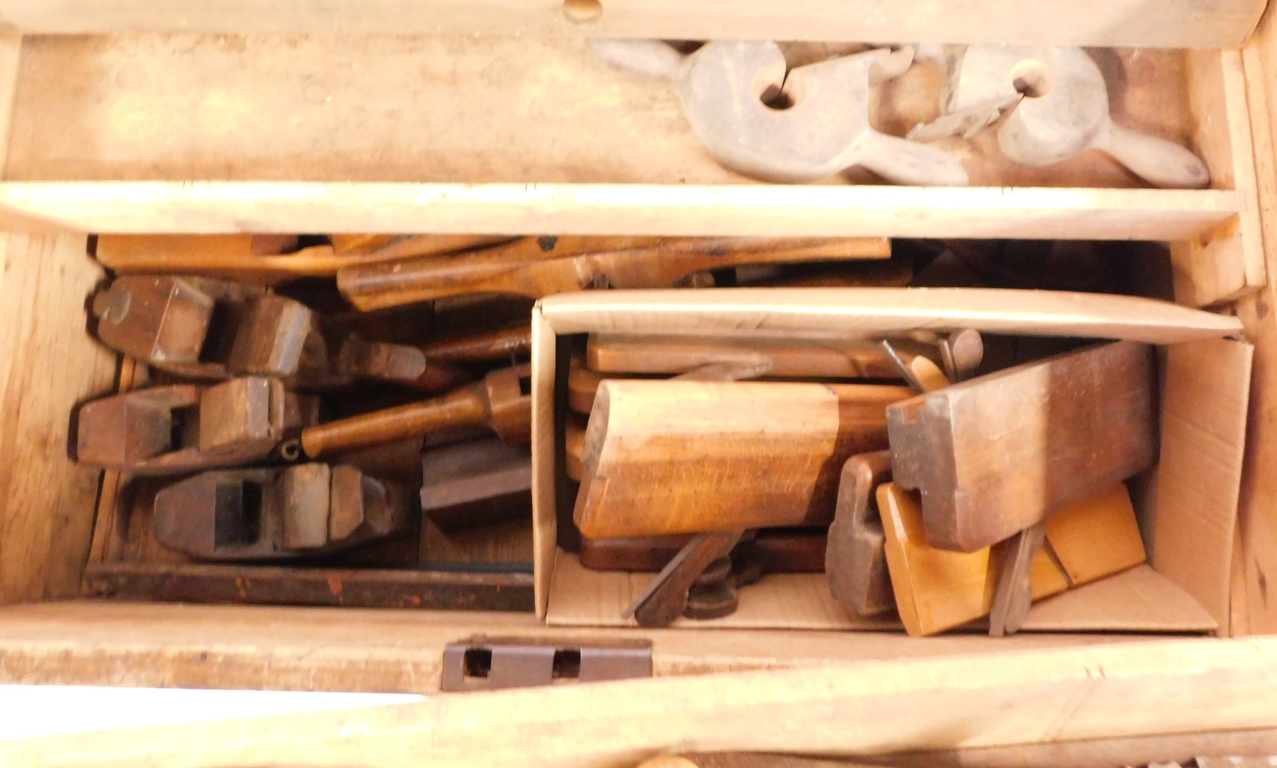 A stained pine carpenter's tool chest, containing moulding planes, braces, saws and other tools, che - Image 3 of 5