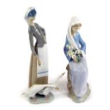 A Lladro porcelain figure of a lady seated holding a clutch of Calla lilies, together with a Lladro