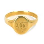 An 18ct gold gents signet ring, with oval ring head bearing the initials AHD, ring size W½, 5.1g all