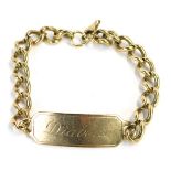 A 9ct gold identity bracelet, with central panel inscribed diabetic, on curb link with clip clasp, 2