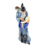 A Royal Doulton figure The Wizard, HN2877, printed marks beneath, 23cm high.