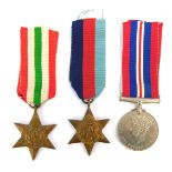 A 1939 - 19435 Star, an Italy Star, a War Medal 1939 - 1945, plus miniatures, awarded to 30021475 A