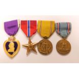 Four US American service medals and awards, being the Purple Heart, all services Bronze Star from 19