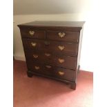 A George III oak chest, of two short and three long graduated drawers, with brass solid back plate h