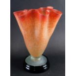 A 20thC orange and red clear speckled glass handkerchief vase, in the style of Murano, with rough po