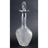 An Edward VII cut glass and silver decanter, with a hobnail cut design and shaped stopper, with flar