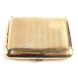 A 20thC gold plated cigarette case, partially engine turned with vacant cartouche, 9cm long.