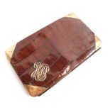 A Finnigan's fine leather crocodile finish case, with 9ct gold decoration, part fitted interior and