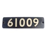 A 20thC railway train or engine number sign, 61009, in raised white numbers on black ground, 15cm x