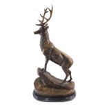 After Moigniez. a hollow bronze figure of a stag, signed, 75cm high.