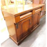 A Victorian mahogany sideboard, with cushion drawers above double cupboard, on plain base.