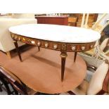 A Continental coffee table, with oval marble finish top, the frieze set with porcelain style plaques