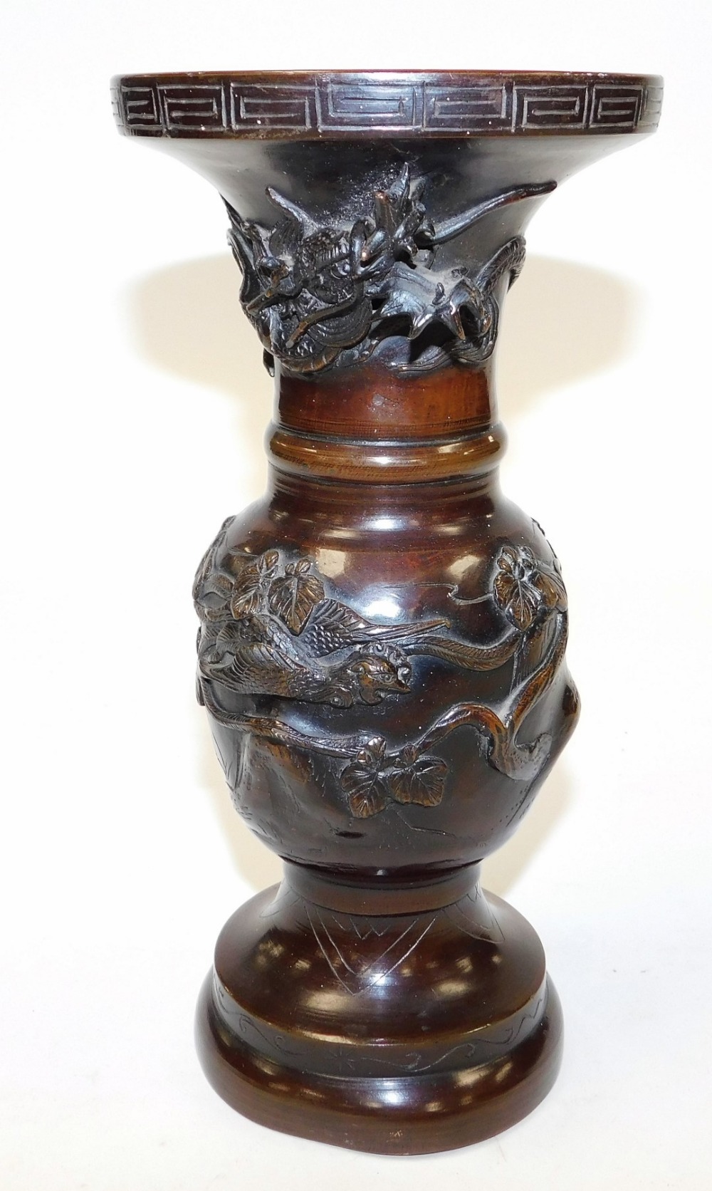A pair of Japanese Meiji period bronze vases, cast with dragons, phoenixes and trees, 25cm high. (AF - Image 2 of 7