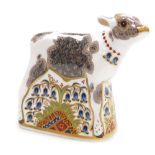 A Royal Crown Derby porcelain Bluebell Calf paperweight, red printed marks and gold stopper, 12.5cm