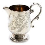 A George III silver cream jug, with sparrow beak spout and ornate scroll handle, the body bright cut