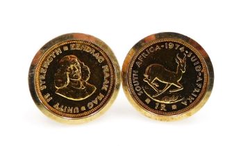 Two South African one rand coins 1974, mounted as cufflinks, stamped 9ct, 17.1g.