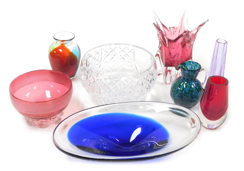 A group of cut and coloured glassware, including a cranberry glass bowl, Victorian mottled glass cre